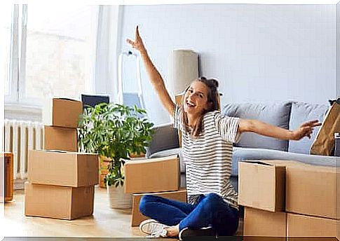 Woman packs boxes for her move