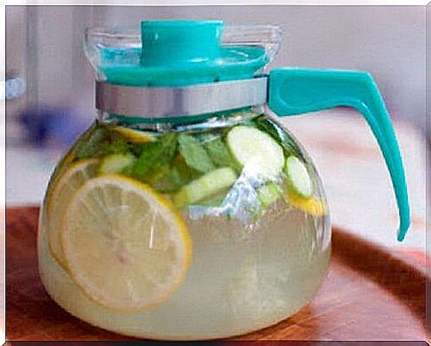 Jar Filled With A Drink Made From Ginger And Lemon And Cucumber