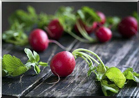 Radishes on a wooden table