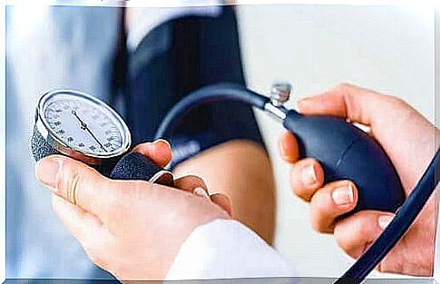 Doctor is measuring blood pressure